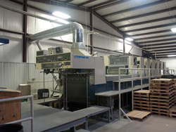 Operators End of the Komori 8000II Platesetter